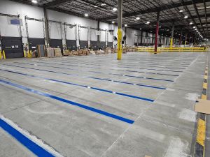 Polyurea warehouse striping by Curbo